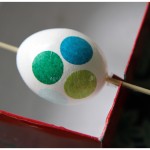 Decoupage Easter eggs with circles of colorful tissue paper Decoupage Easter eggs with circles of colorful tissue paper